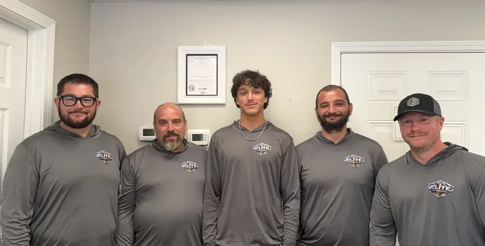 The Elite Home Solutions team at their Jacksonville, NC office